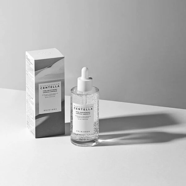 "SKIN1004 মাদাগাস্কার সেন্টেলা আসিয়াটিকা অ্যাম্পুল – স্বচ্ছ সাদা বোতলে সোনালি ঢাকনাযুক্ত একটি হালকা ও ময়েশ্চারাইজিং ফেসিয়াল সিরাম, ১০০মিলি"