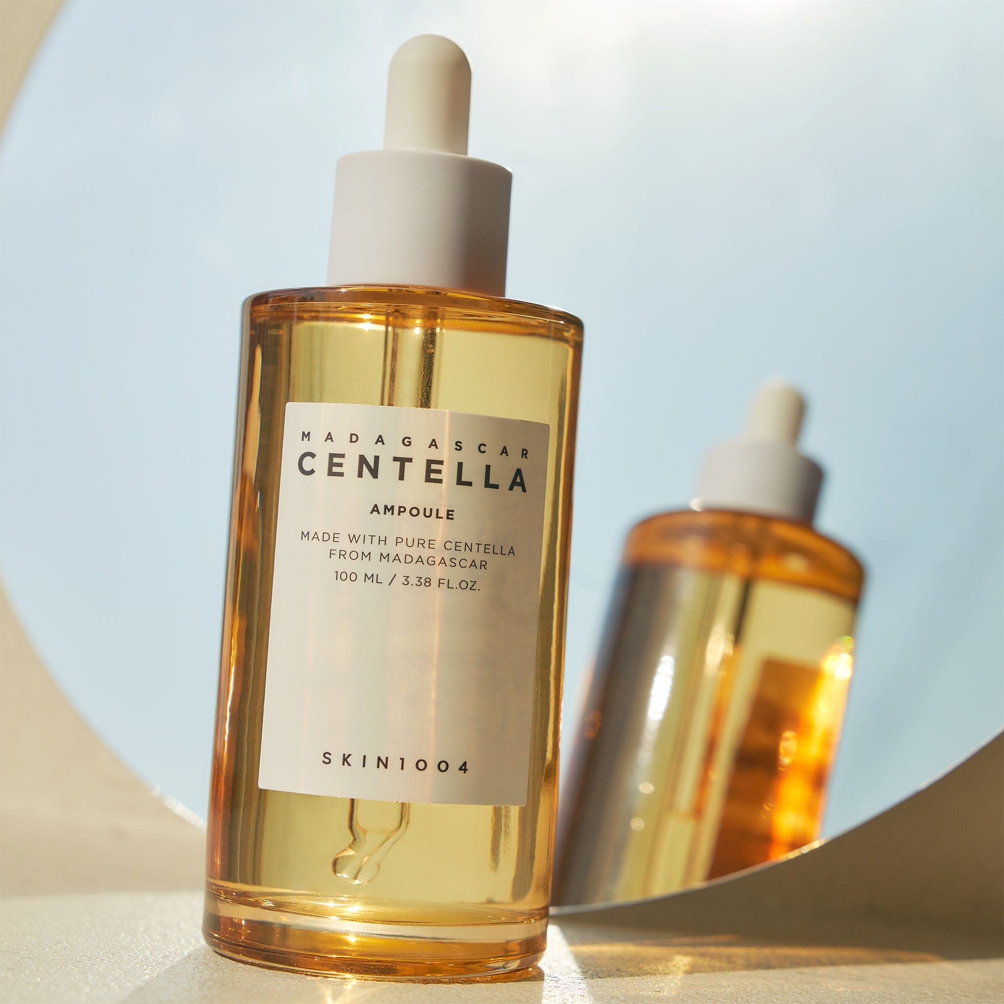 "SKIN1004 Madagascar Centella Ampoule –সেন্টেলা অ্যাসিয়াটিকা-ভিত্তিক হালকা, ত্বক শান্ত ও আর্দ্রতা যোগকারী কোরিয়ান স্কিনকেয়ার পণ্য।"
